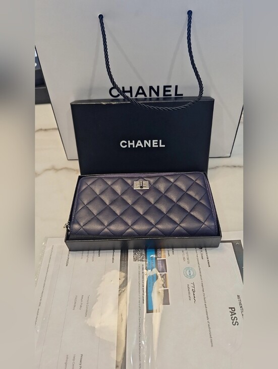 CHANEL Handbags - Chanel Purple Quilted Leather Zip Around Wallet EUC